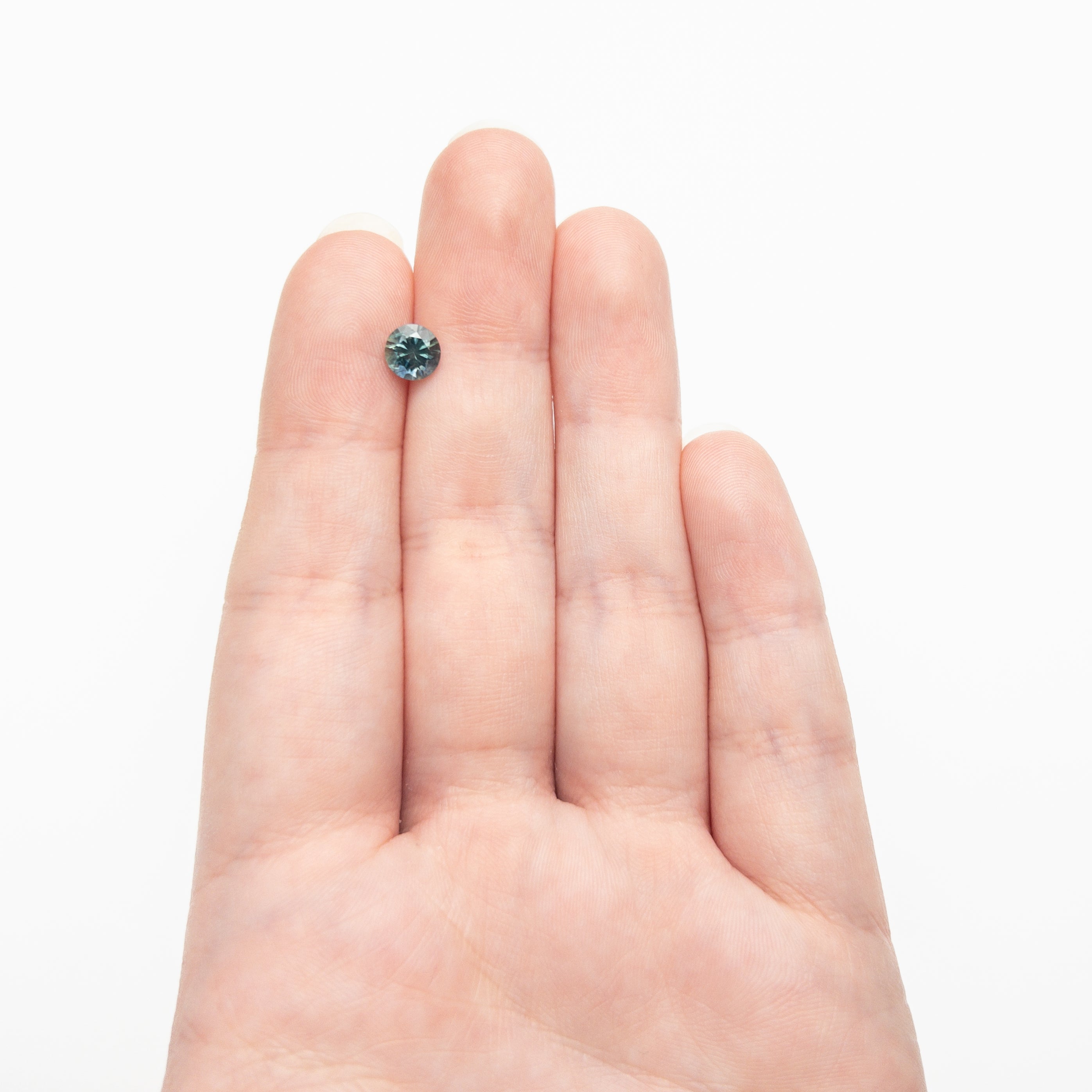 1.09ct 6.09x60.7x4.19mm Round Brilliant Sapphire 26141-21