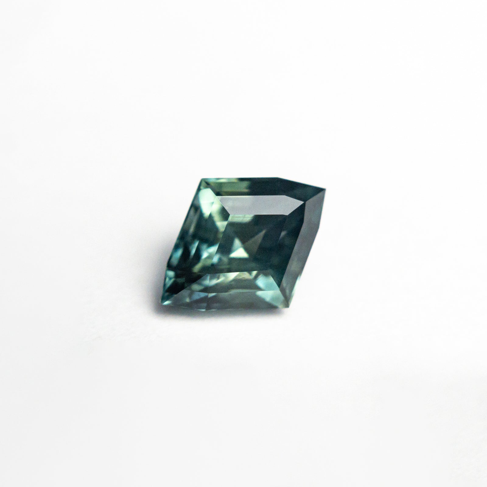 1.25ct 8.21x6.33x4.23mm Lozenge Step Cut Sapphire 26463-01