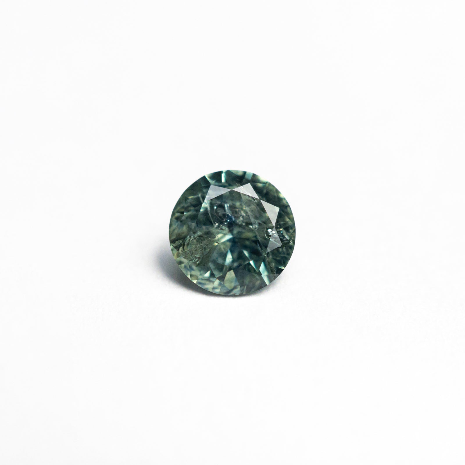 0.59ct 5.17x5.13x3.10mm Round Brilliant Sapphire 26556-21