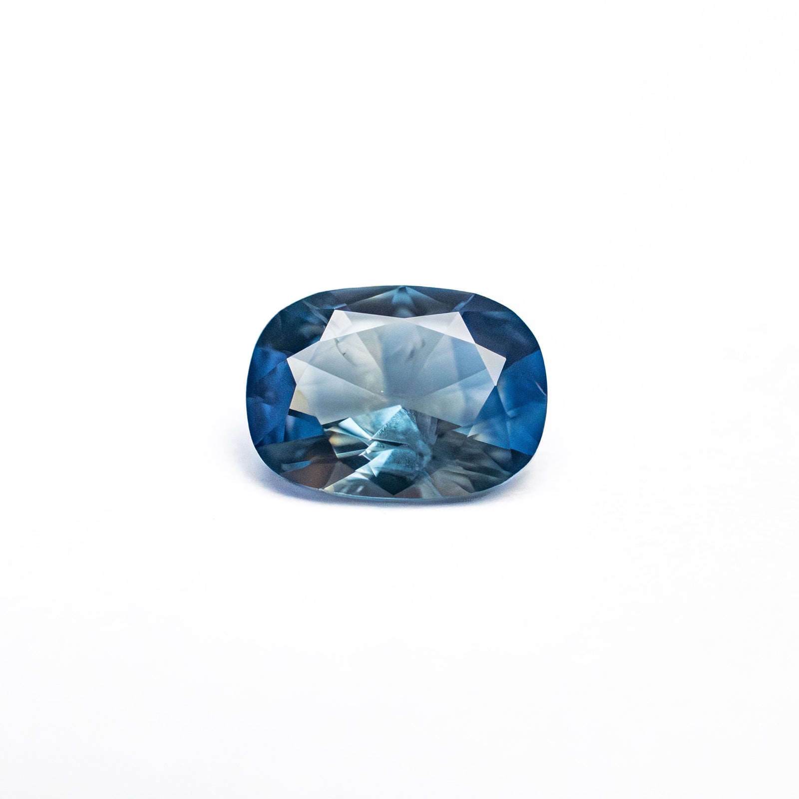 0.64ct 6.32x4.62x2.69mm Cushion Brilliant Sapphire 26673-11