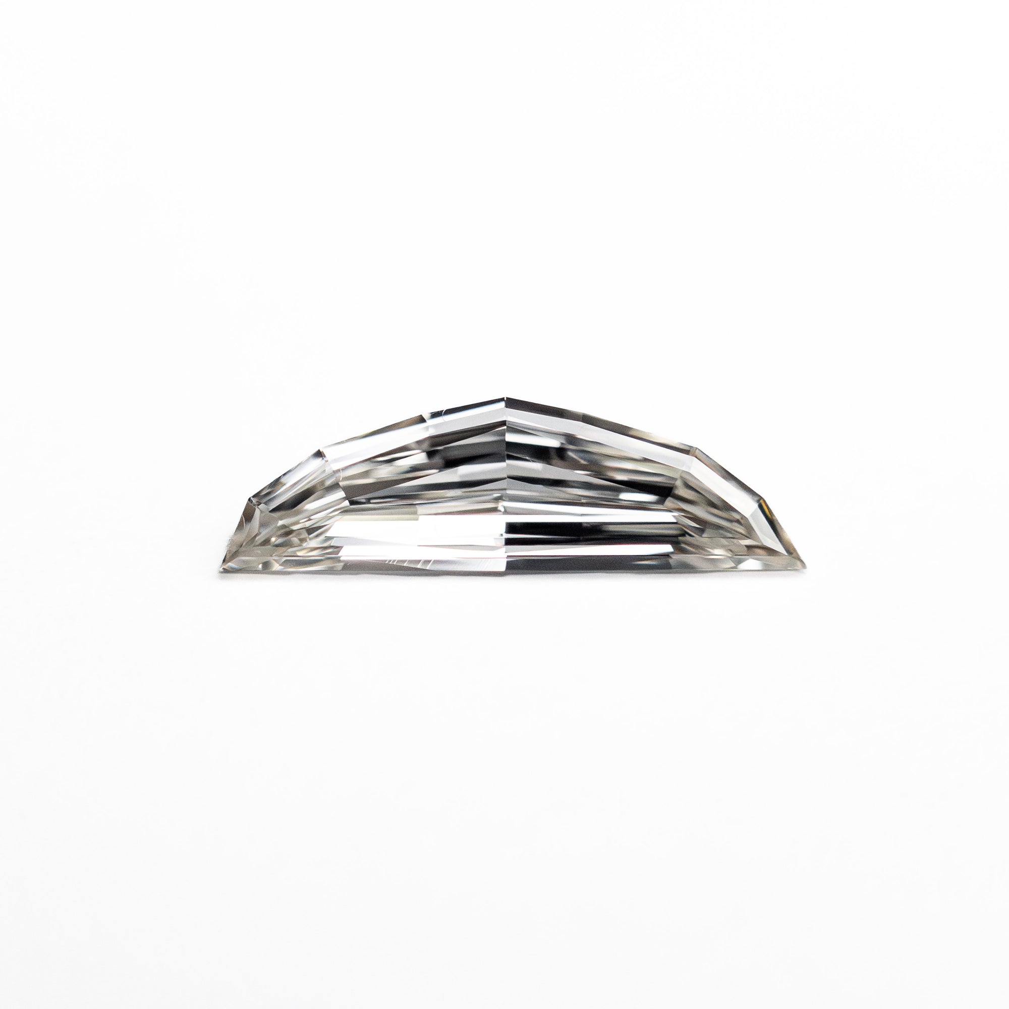 0.28ct 9.66x2.85x1.41mm VS2 H Epaulette Step Cut 26751-01