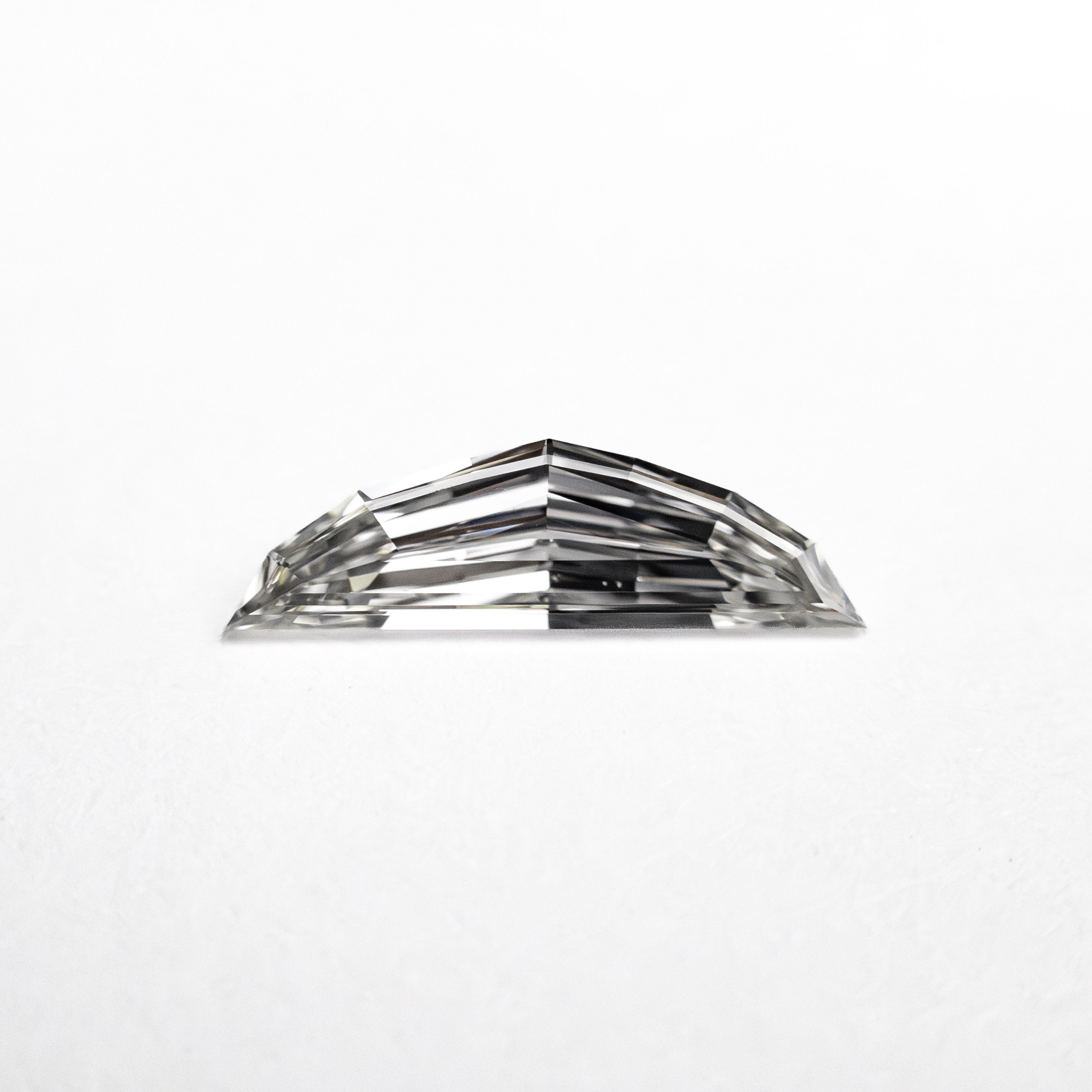 0.31ct 9.80x2.91x1.55mm VS1 H Epaulette Step Cut 26751-02