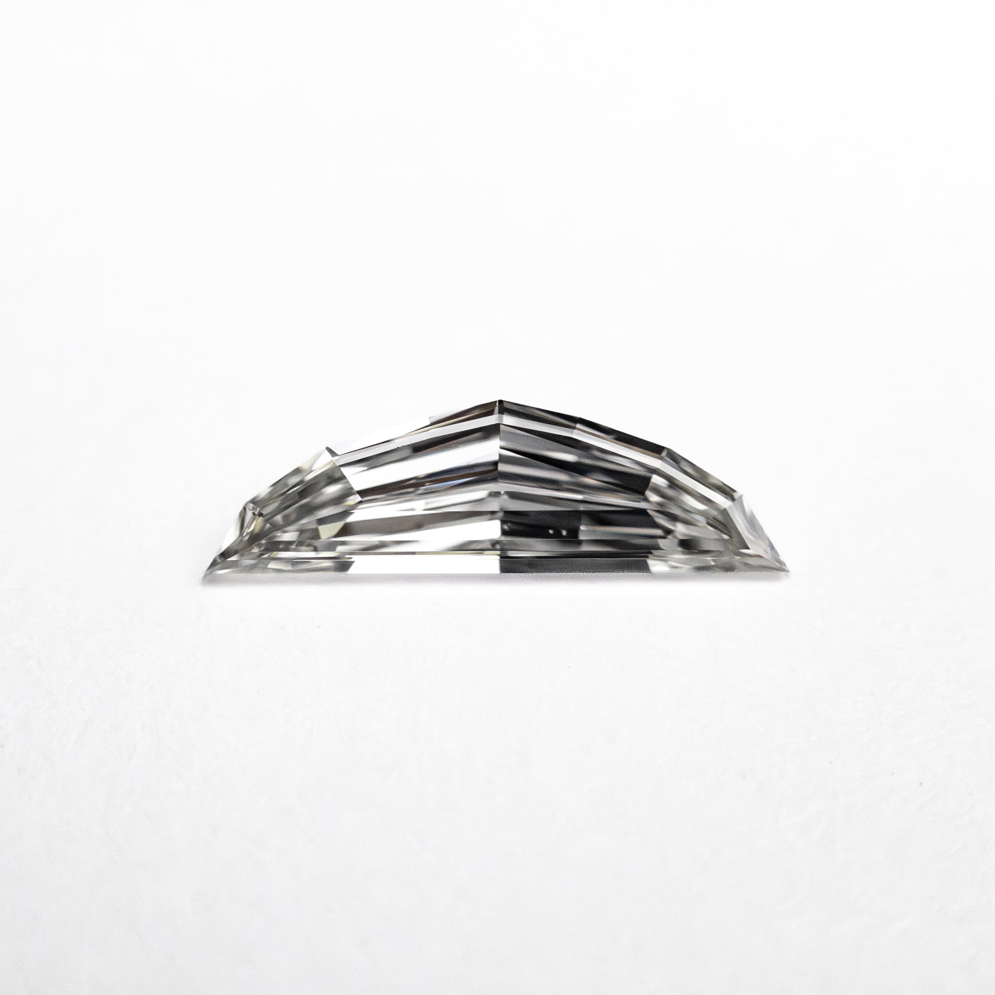 0.31ct 9.80x2.91x1.55mm VS1 H Epaulette Step Cut 26751-02