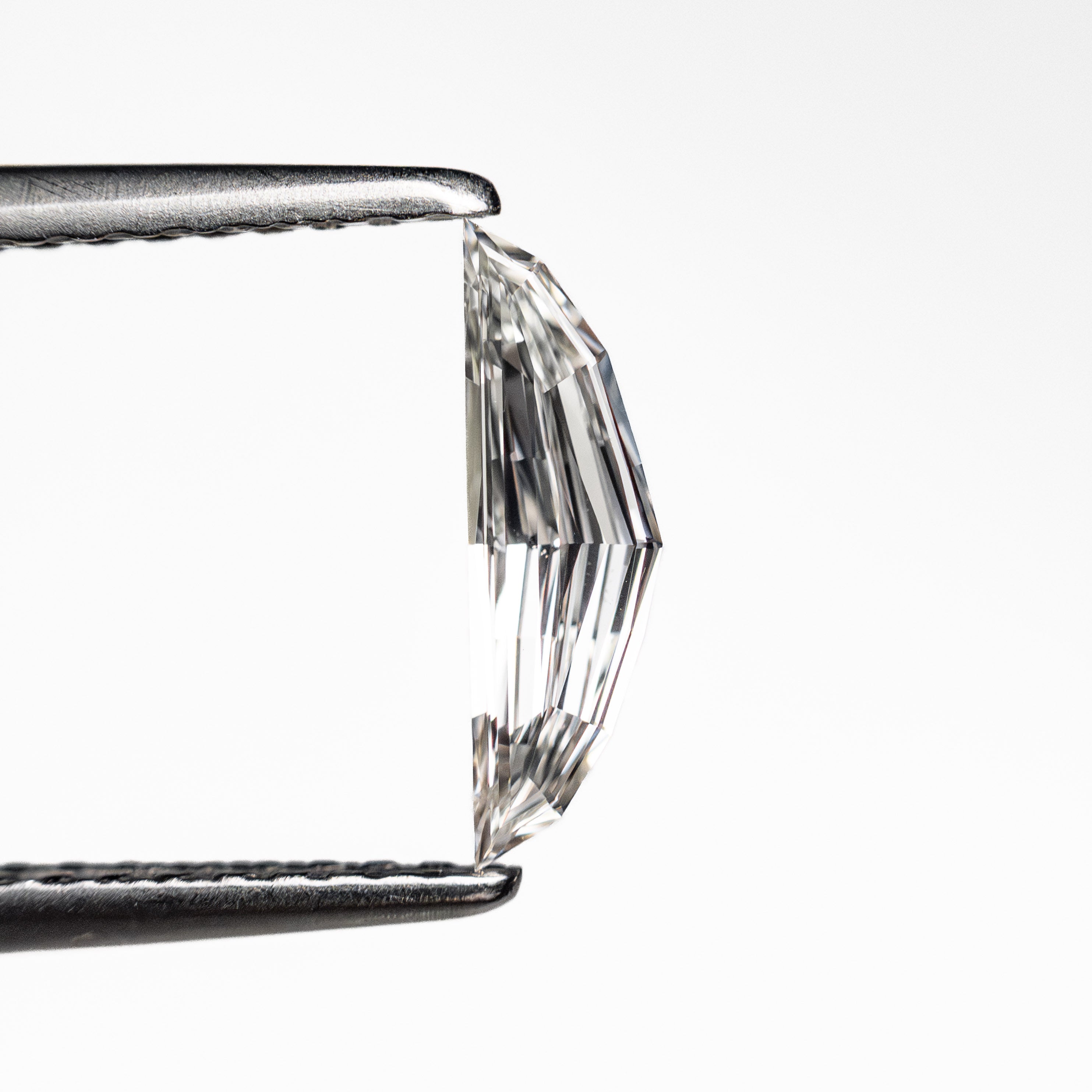 0.31ct 9.80x2.91x1.55mm VS1 H Epaulette Step Cut 26751-02