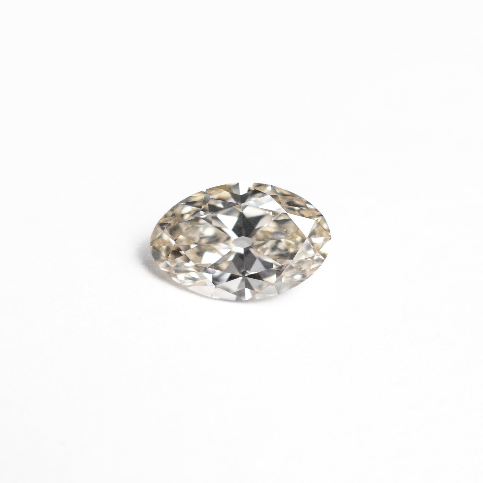 0.60ct 7.05x4.61x2.66mm VS2 M Oval Brilliant 🇨🇦 26816-01