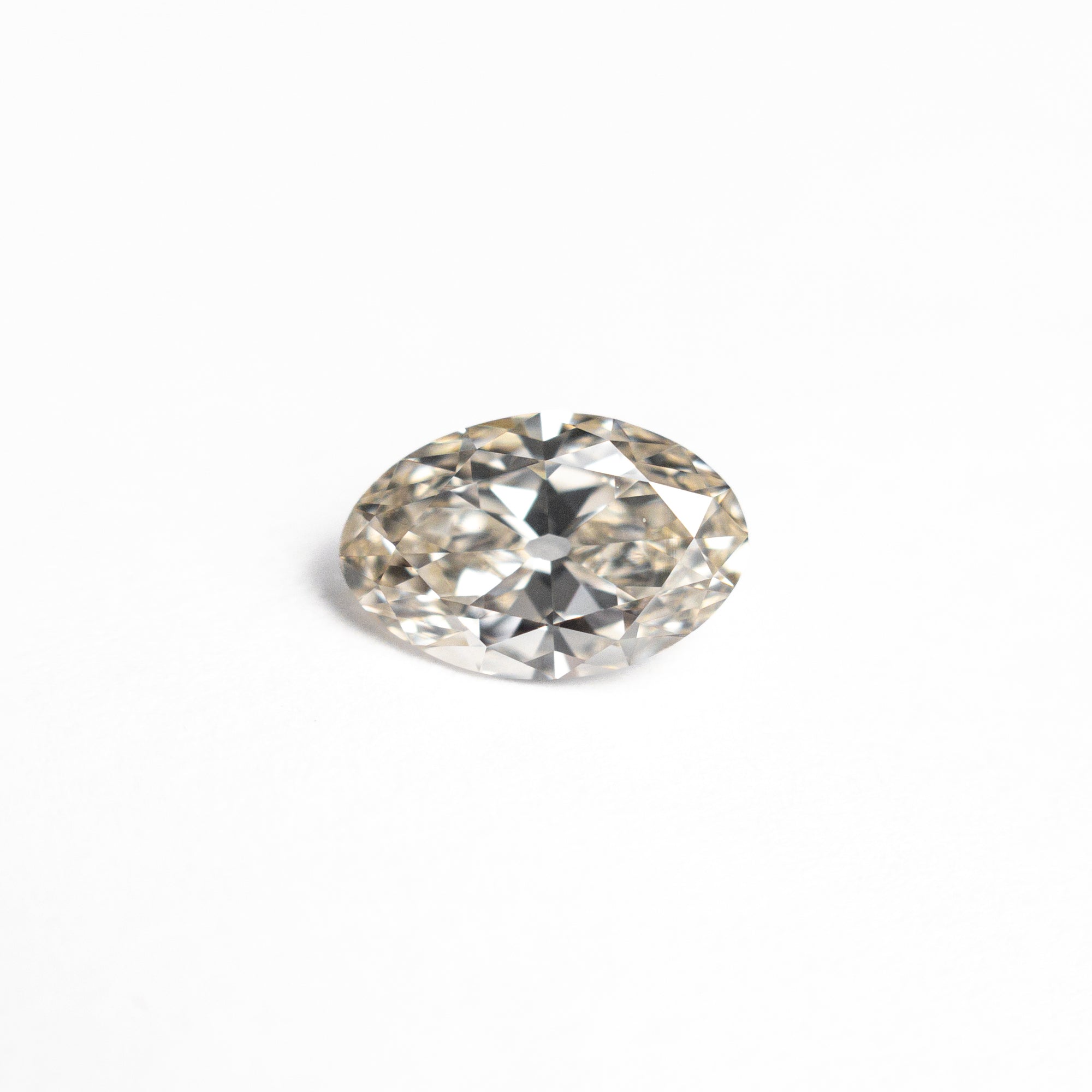 0.60ct 7.05x4.61x2.66mm VS2 M Oval Brilliant 🇨🇦 26816-01
