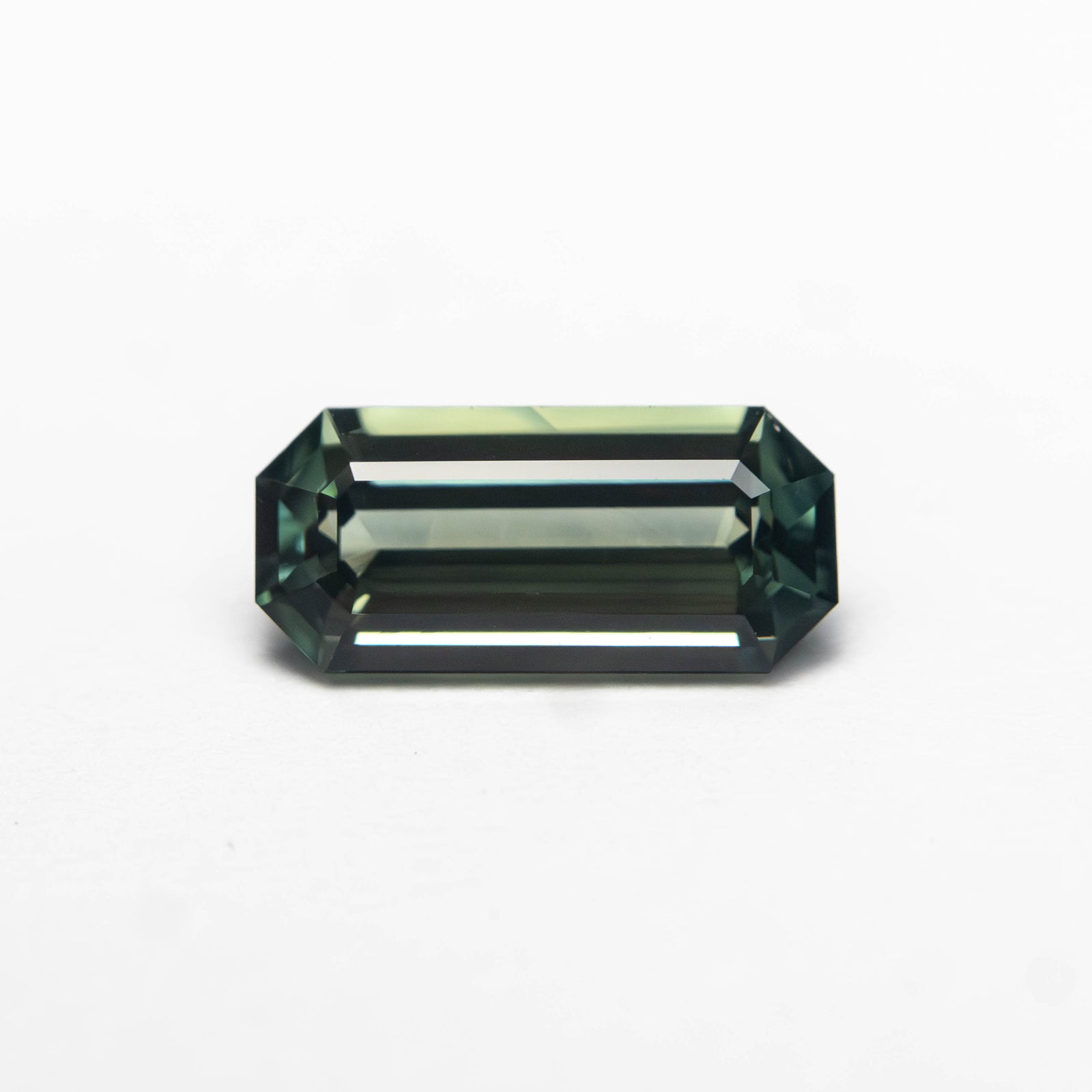 1.10ct 8.85x4.08x2.90mm Cut Corner Rectangle Step Cut Sapphire 27329-04
