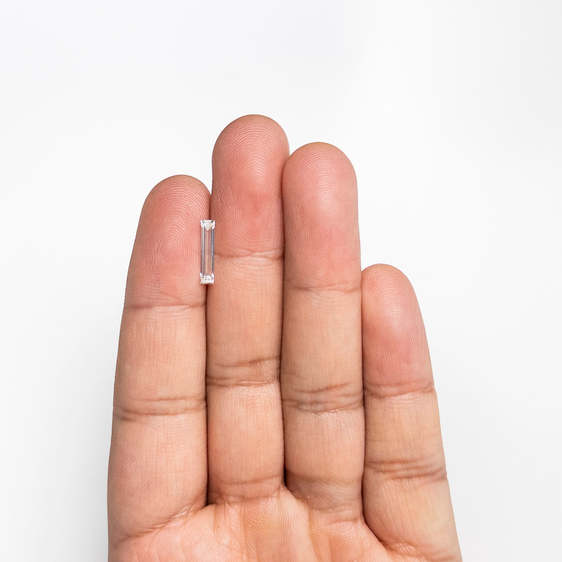 0.68ct 12.55x2.67x1.80mm Rectangle Step Cut 27410-02