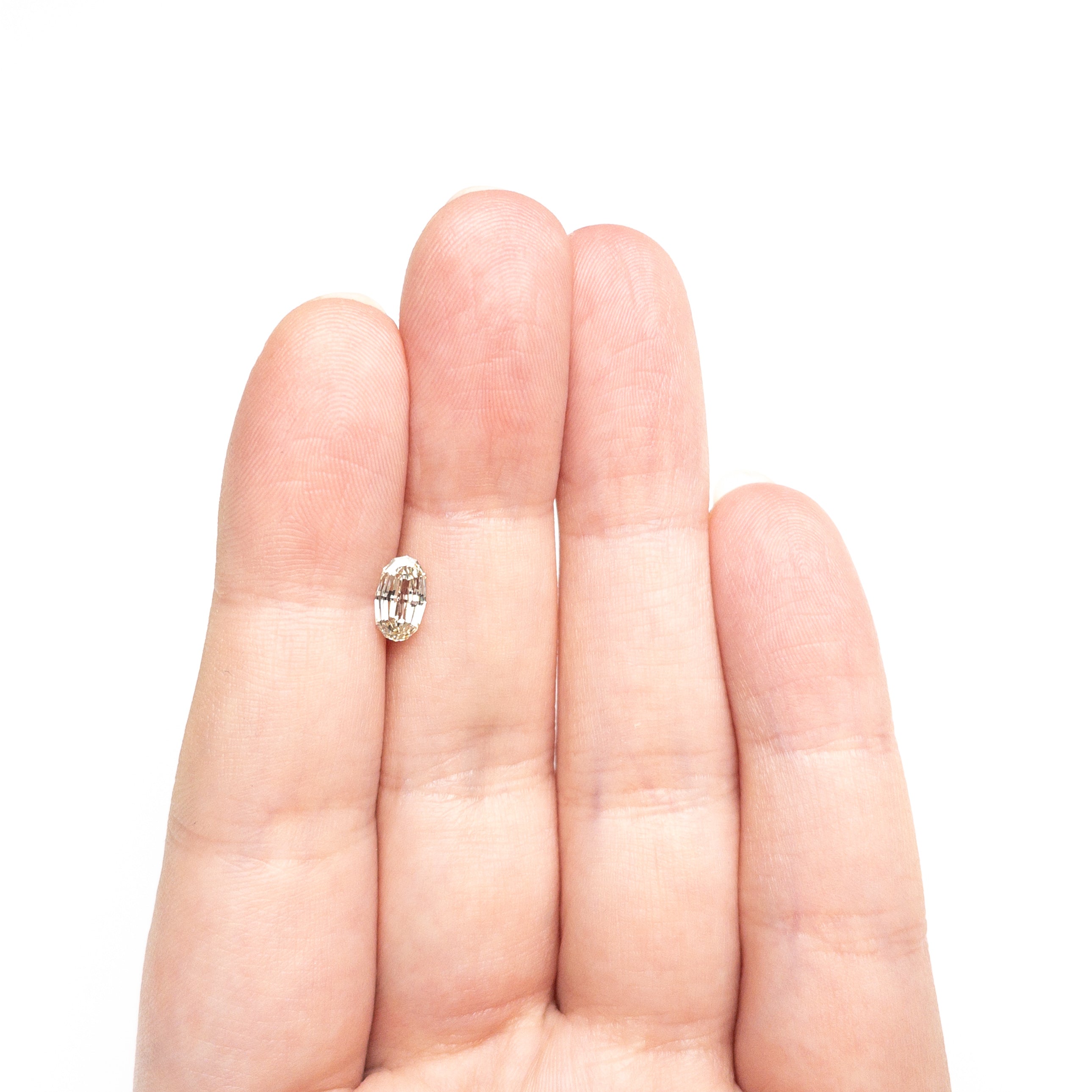 0.70ct 7.61x4.49x2.46mm VS2 O-P Geo Oval Step Cut 🇿🇦 27526-01