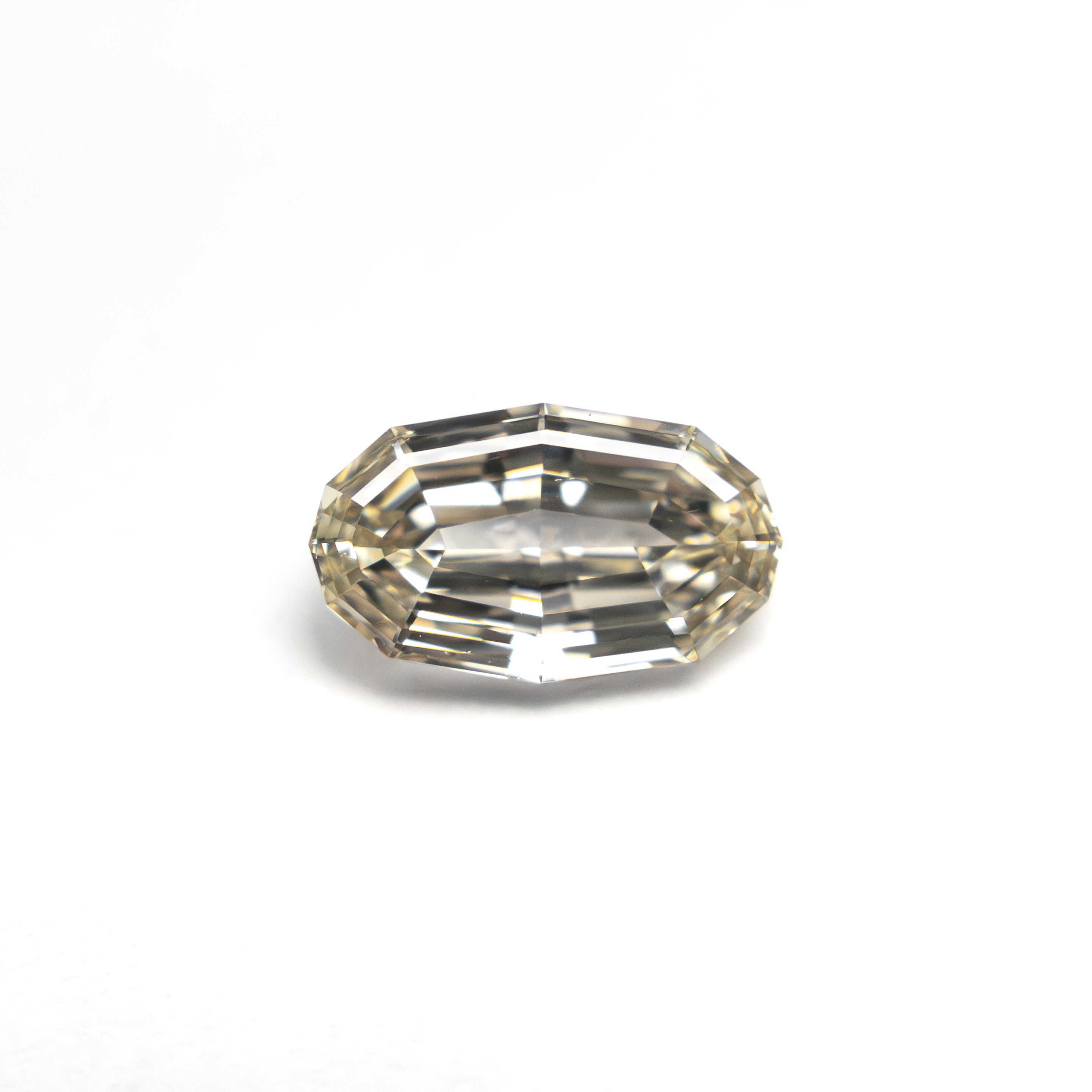 0.70ct 7.61x4.49x2.46mm VS2 O-P Geo Oval Step Cut 🇿🇦 27526-01