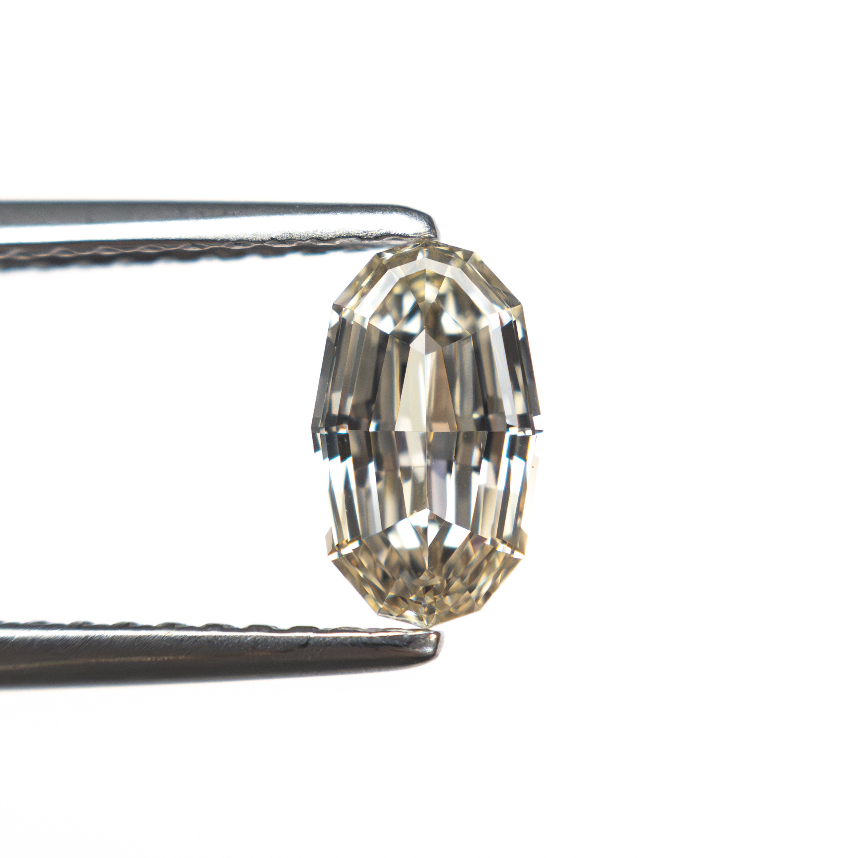 0.70ct 7.61x4.49x2.46mm VS2 O-P Geo Oval Step Cut 🇿🇦 27526-01