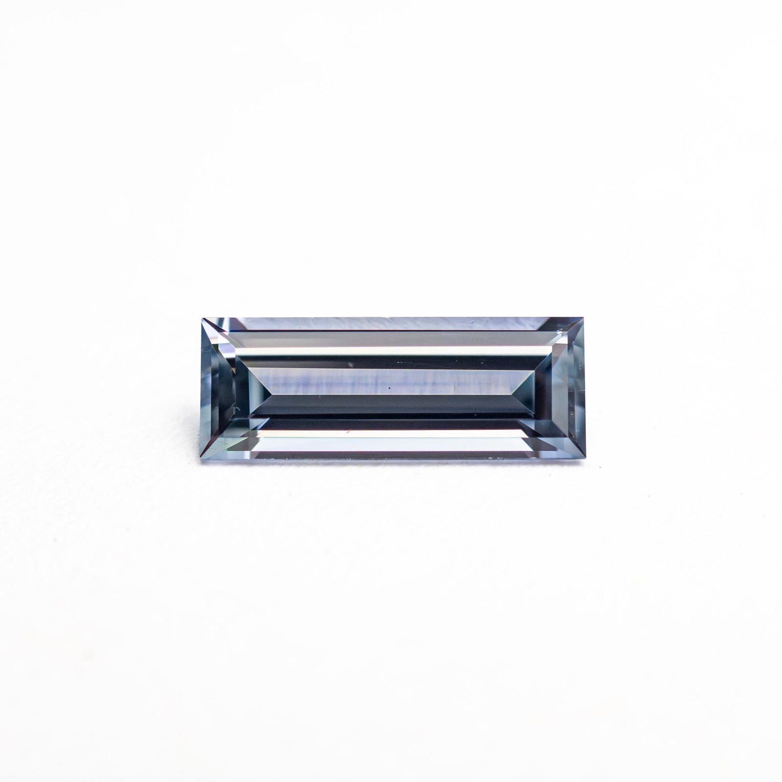 0.57ct 8.05x3.02x2.09mm Baguette Step Cut Sapphire 27721-02