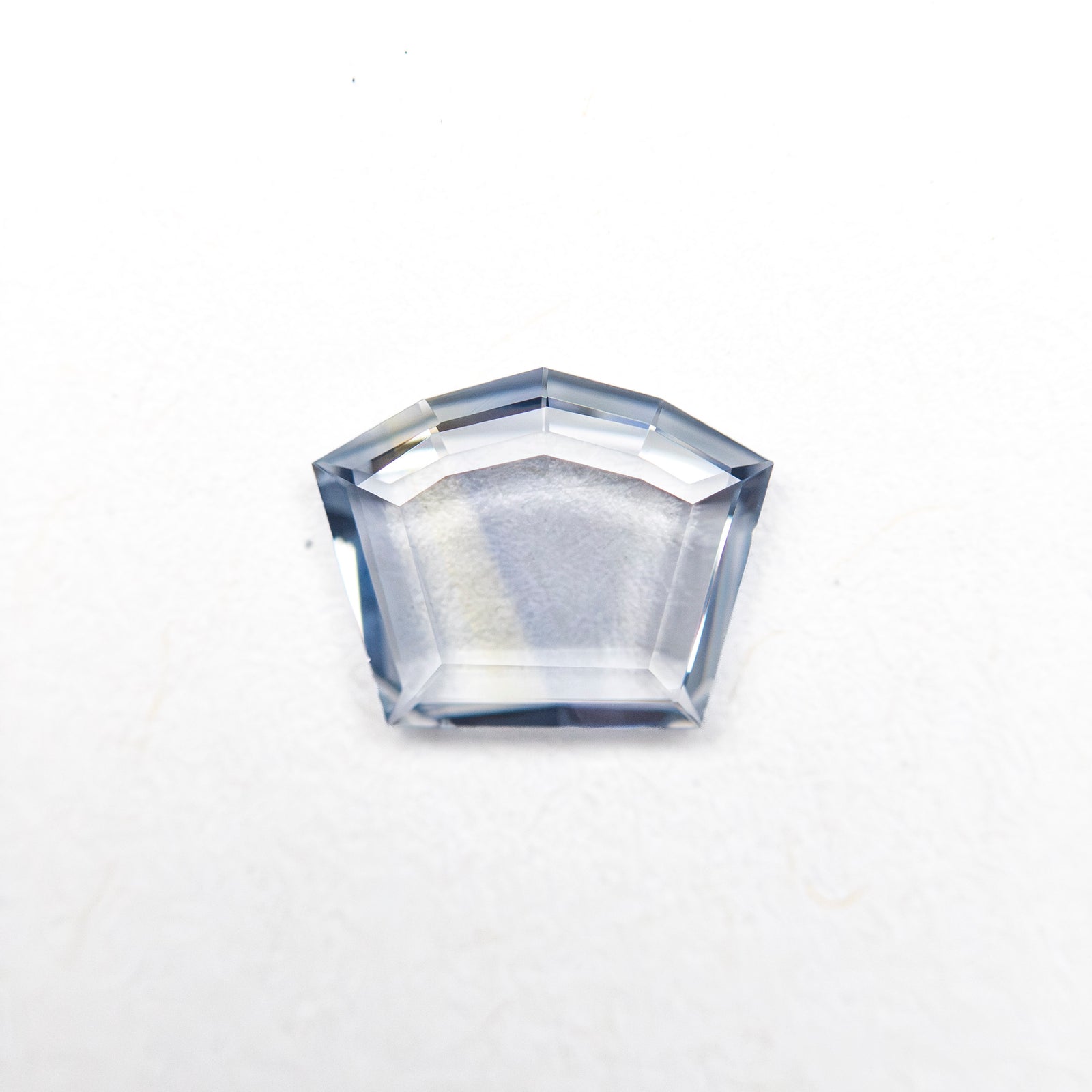 0.59ct 5.61x7.04x1.35mm Shield Portrait Cut Sapphire 27740-13