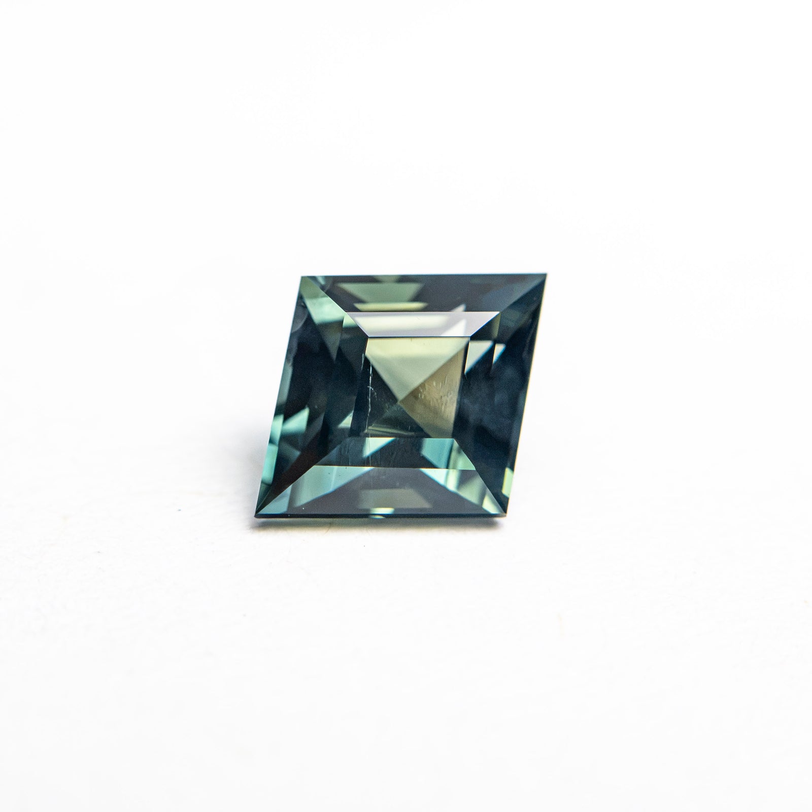 0.98ct 7.89x6.43x3.77mm Lozenge Step Cut Sapphire 28199-01