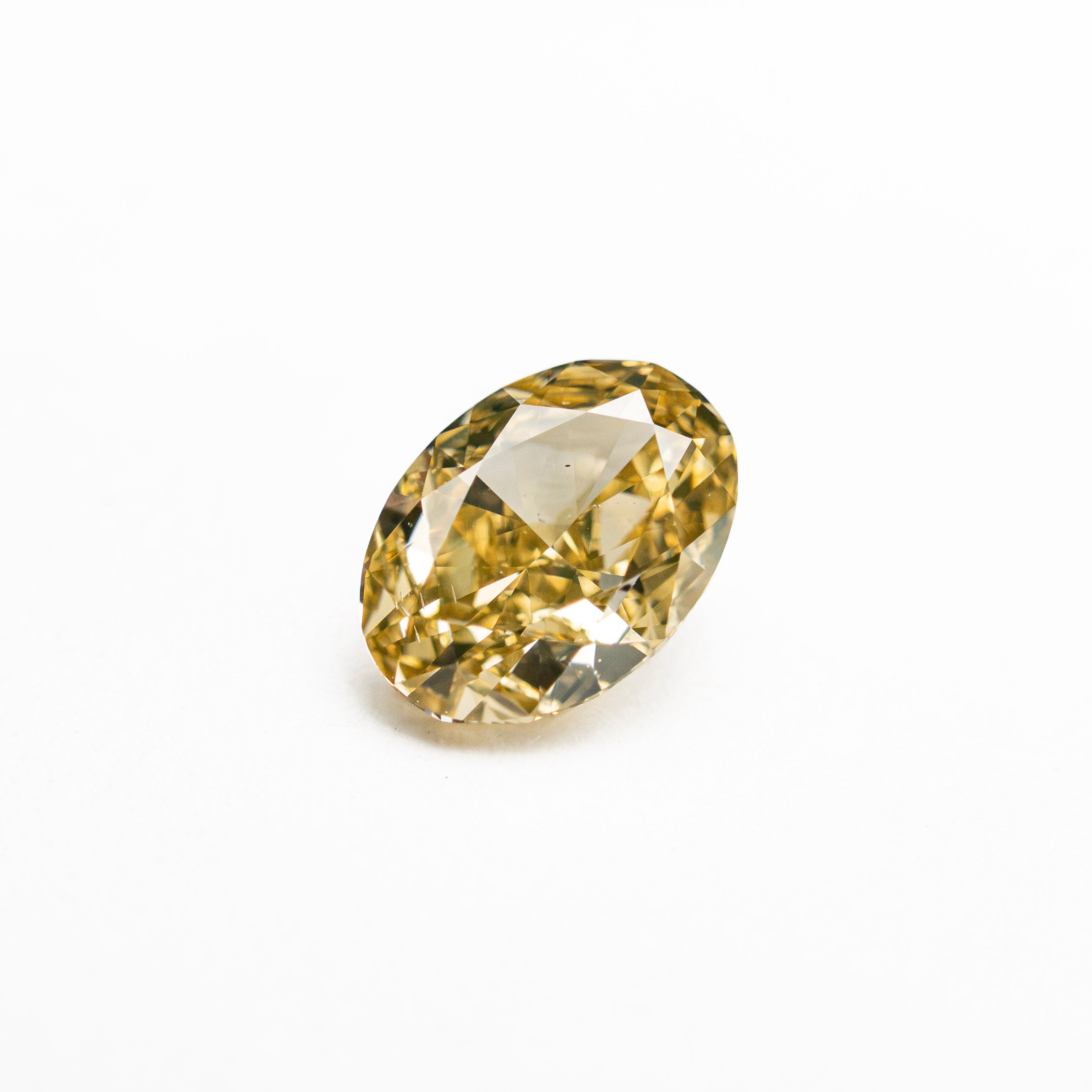 0.75ct 6.51x4.65x3.19mm GIA SI1 Fancy Brownish Orangy Yellow Oval Brilliant 28345-01