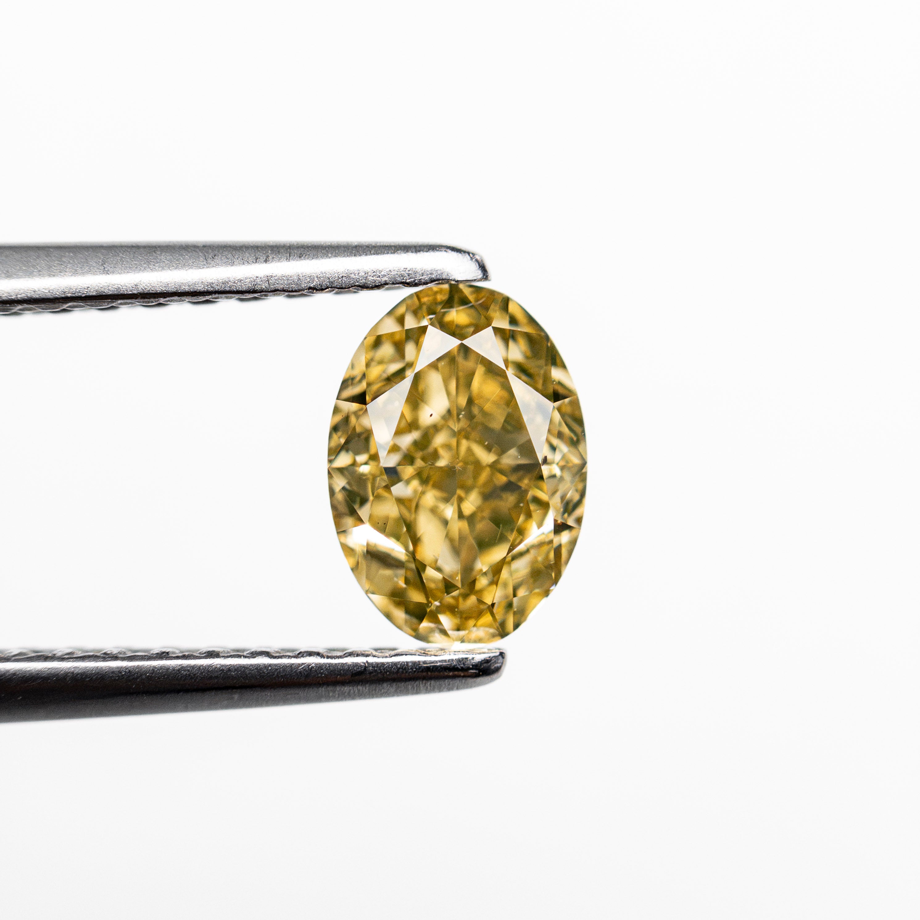 0.75ct 6.51x4.65x3.19mm GIA SI1 Fancy Brownish Orangy Yellow Oval Brilliant 28345-01