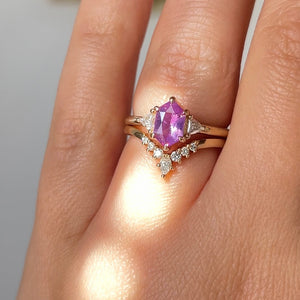 Hexagon Cut Pink Sapphire Ring with crown gold band in sunlight on hand