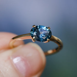 1.42ct Oval Blue Montana Sapphire Low Profile 4 Prong East-West Solitaire in 14k Yellow Gold