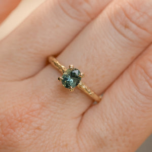 0.85ct Oval Precision Cut Ocean Blue Montana Sapphire Evergreen Carved 4 Prong Solitaire in 14k Yellow Gold