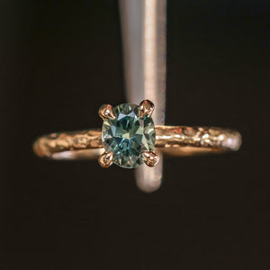 0.85ct Oval Precision Cut Ocean Blue Montana Sapphire Evergreen Carved 4 Prong Solitaire in 14k Yellow Gold