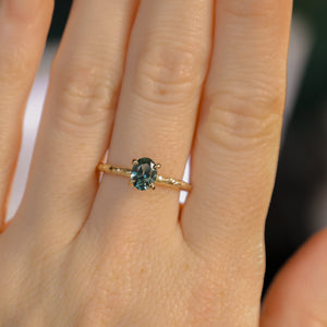 0.80ct Oval Precision Cut Blue Montana Sapphire Evergreen Carved 4 Prong Solitaire in 14k Yellow Gold