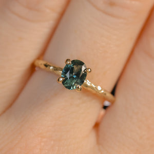 0.80ct Oval Precision Cut Blue Montana Sapphire Evergreen Carved 4 Prong Solitaire in 14k Yellow Gold