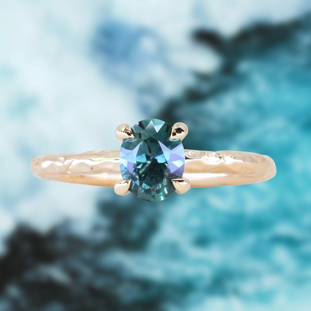 0.80ct Oval Precision Cut Blue Montana Sapphire Evergreen Carved 4 Prong Solitaire in 14k Yellow Gold