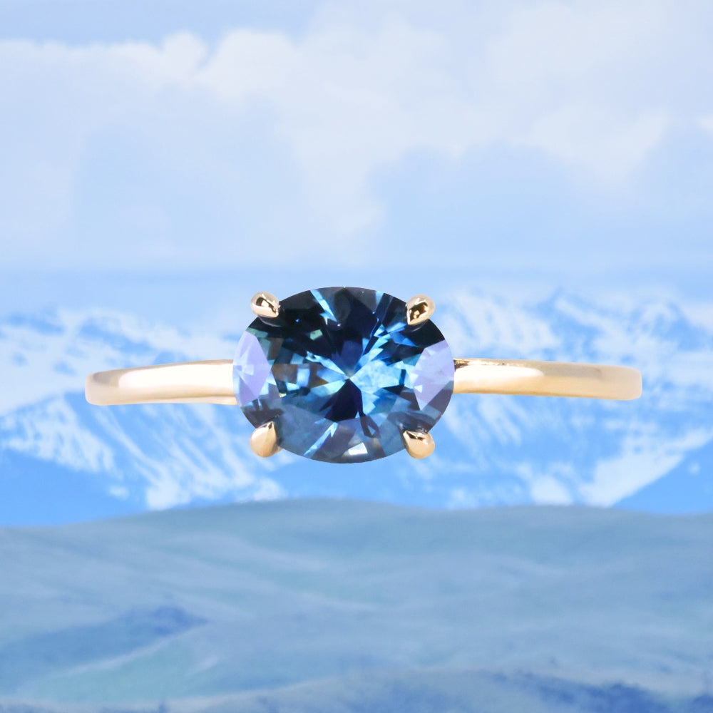 1.42ct Oval Blue Montana Sapphire Low Profile 4 Prong East-West Solitaire in 14k Yellow Gold