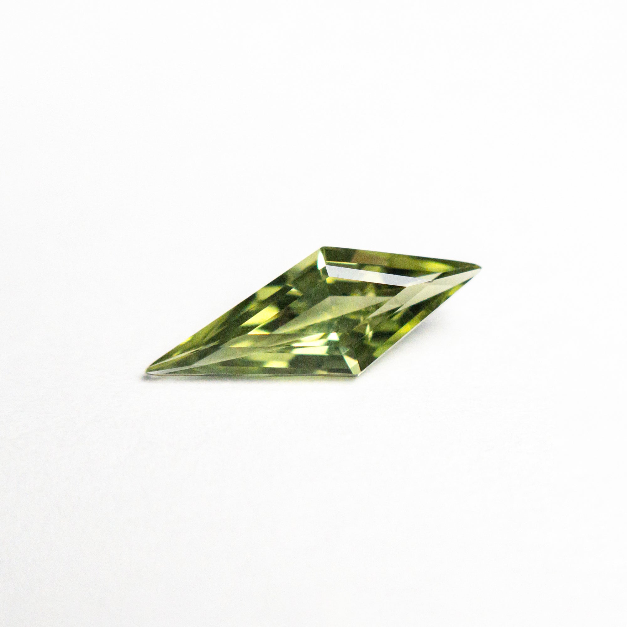 0.63ct 10.86x4.14x2.56mm Kite Step Cut Sapphire 25740-15