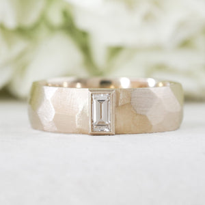 architectural solitaire ring with bezel set gemstone