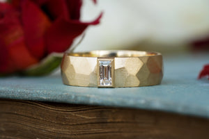 architect-inspired 5mm wedding ring in yellow gold with a baguette diamond