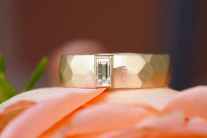architect-inspired 5mm wedding ring in yellow gold with a baguette diamond