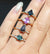Gemstone Rings on hand in sunlight