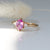 Hexagon Cut Pink Sapphire Ring with feather and reflection