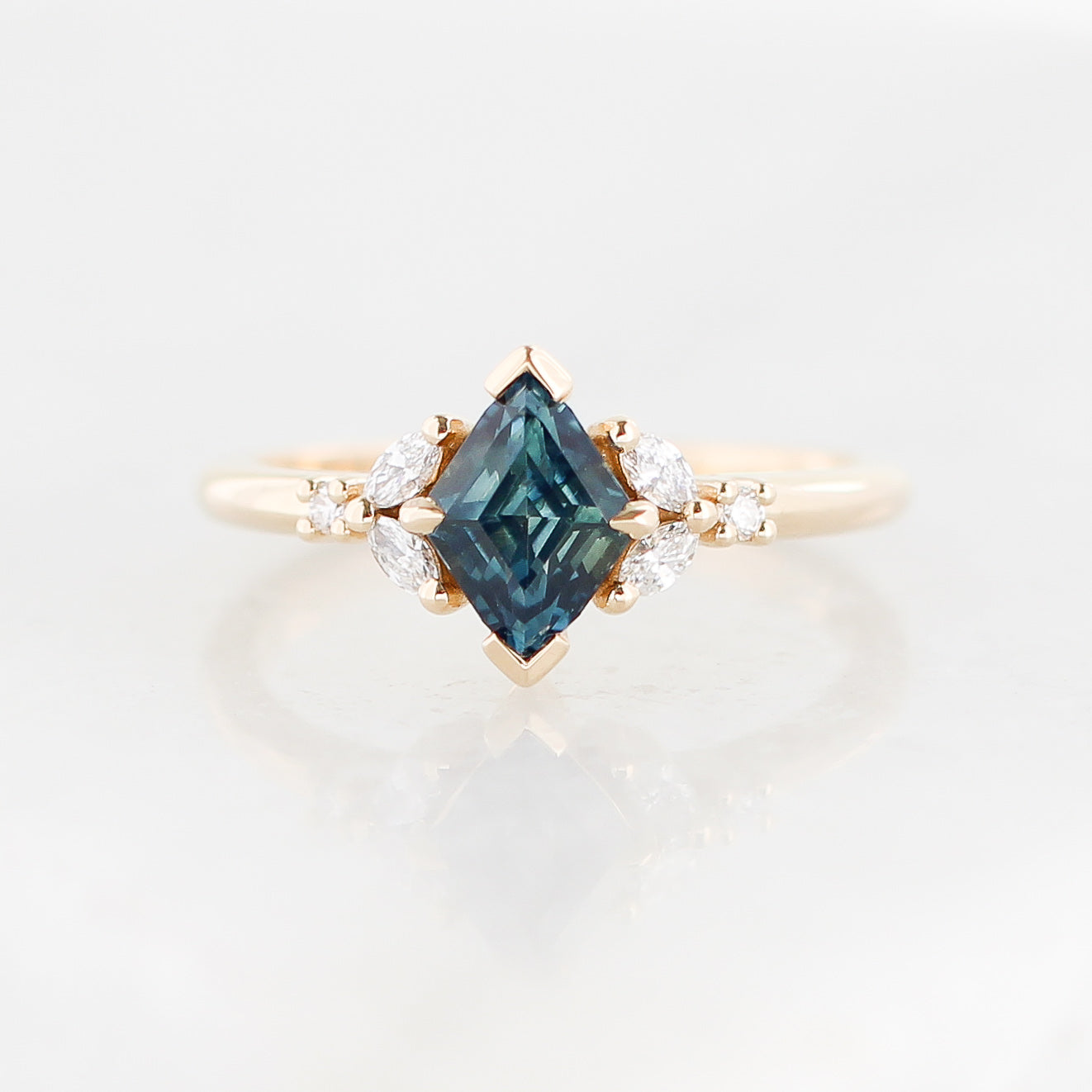 1.25ct Lozenge Step Cut Sapphire <br><b> Yuliya Chorna Jewellery </b>| Folia Teal Sapphire Ring