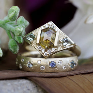 celestial engagement ring with Montana sapphire and diamond accents