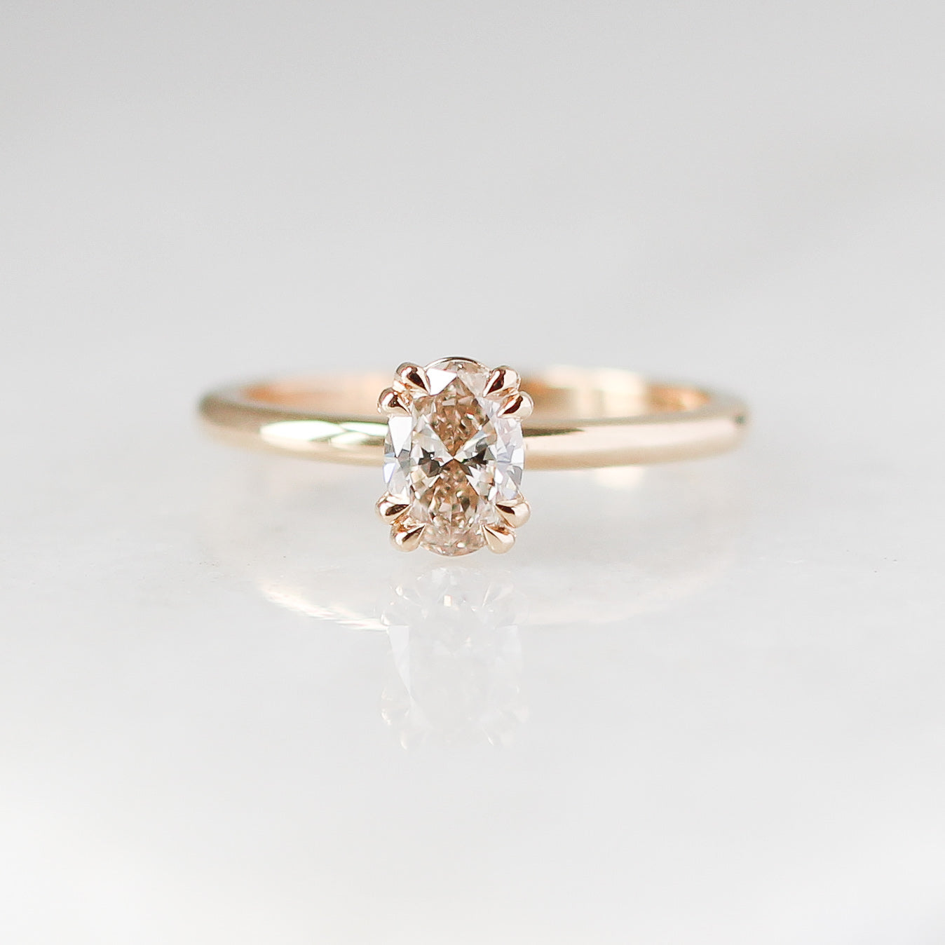 Yellow gold solitaire diamond ring front view
