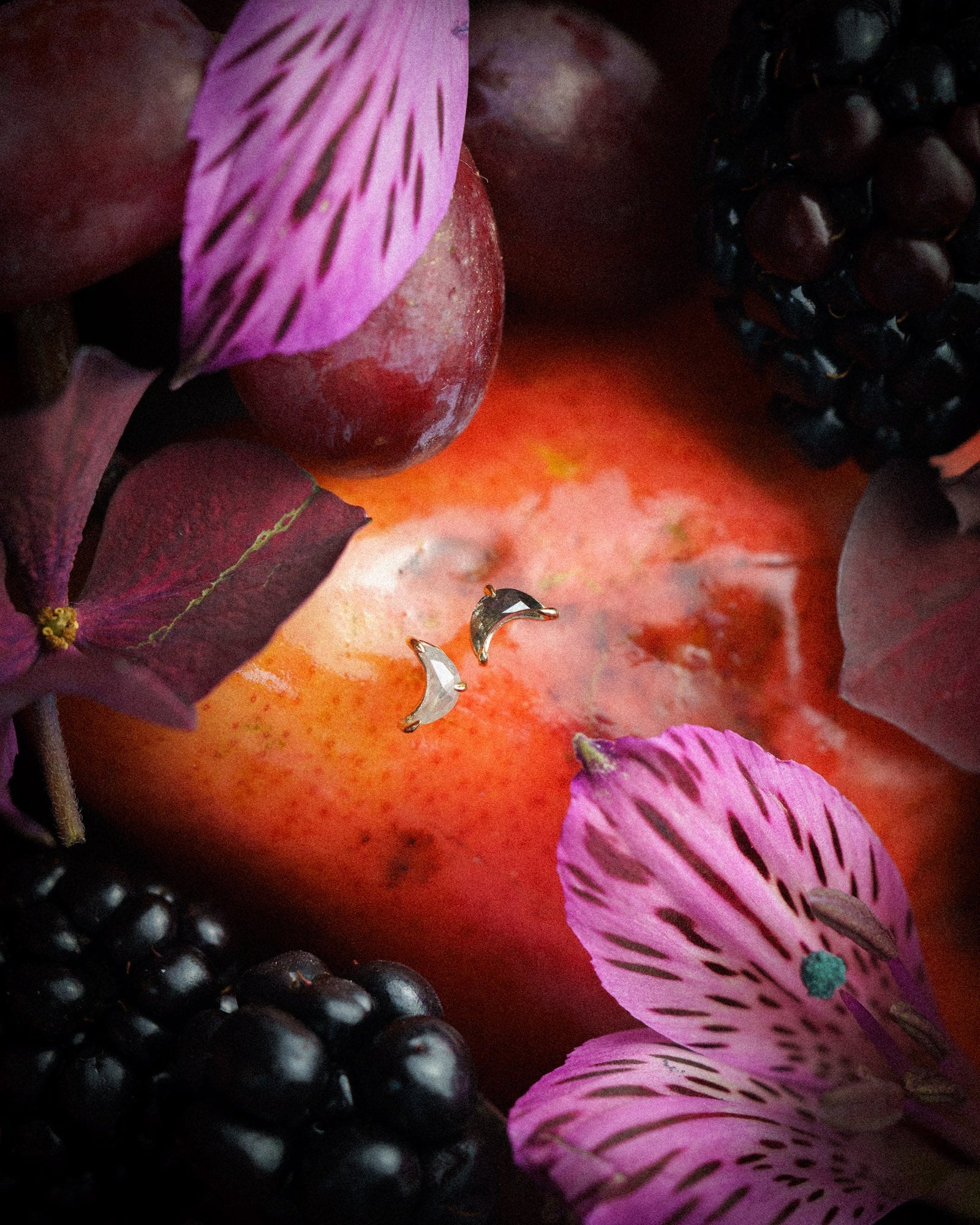 Dark & Light Luna Studs made from salt & pepper diamond crescent moons