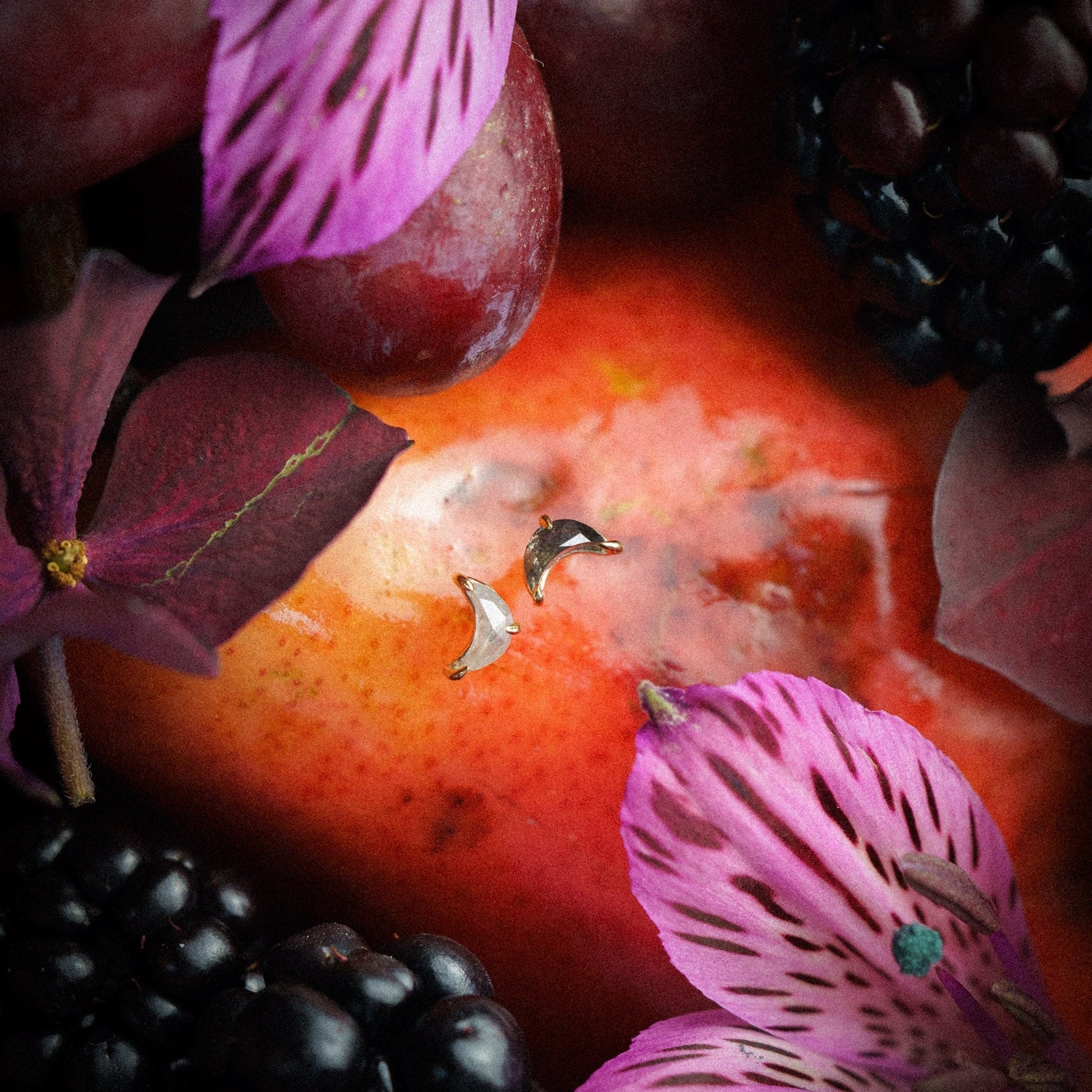 Dark & Light Luna Studs made from salt & pepper diamond crescent moons