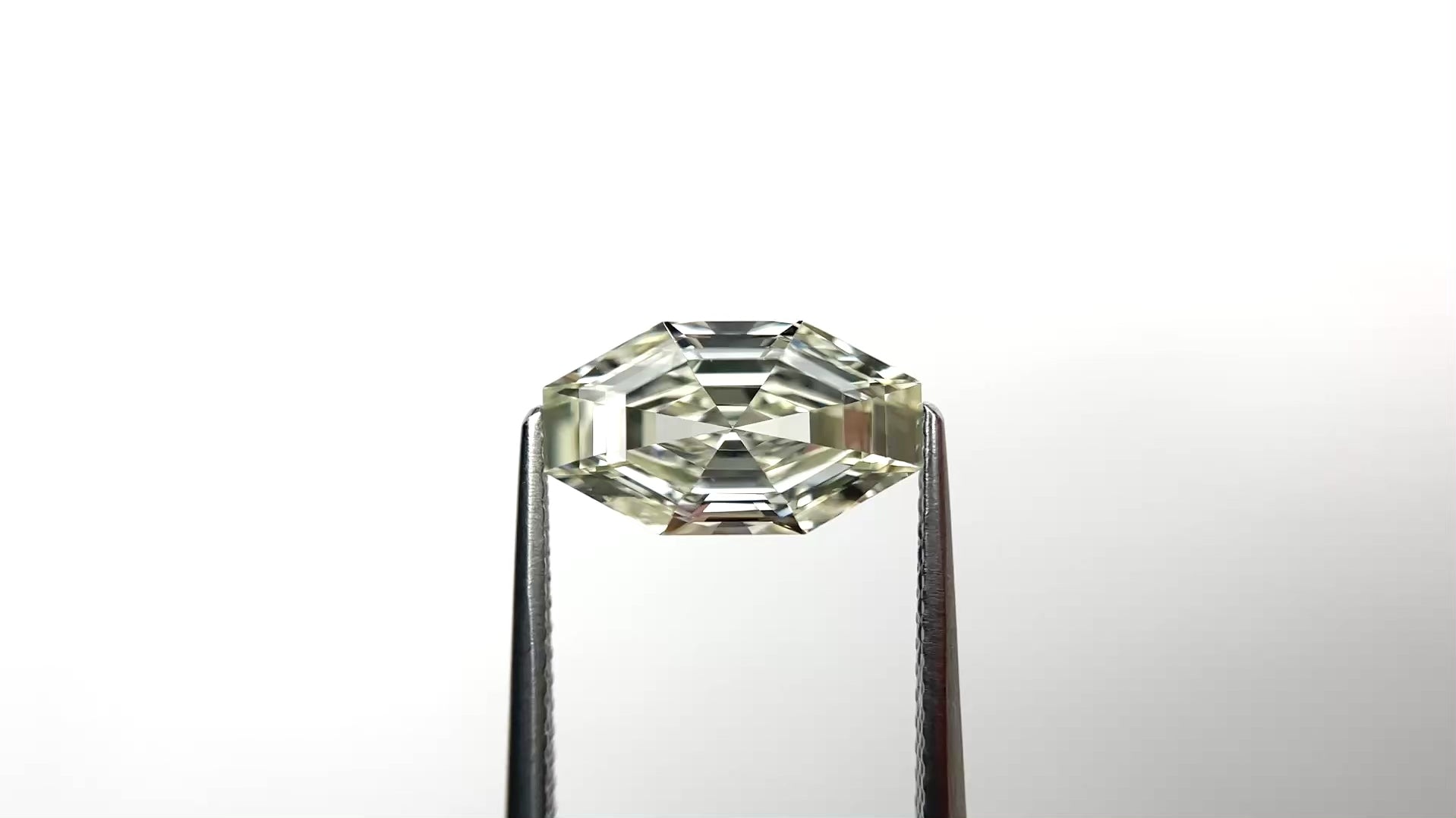 3.04ct 12.95x7.38x4.40mm GIA Internally Flawless N Octagon Step Cut 26543-01