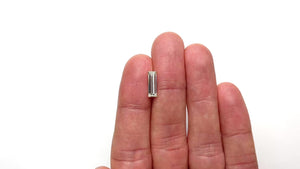 1.52ct 12.21x4.16x2.86mm VS2 O-P Baguette Step Cut 26124-01