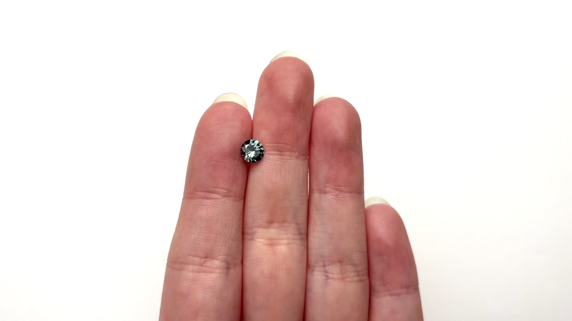 1.04ct 6.10x6.07x3.89mm Round Brilliant Sapphire 26141-25