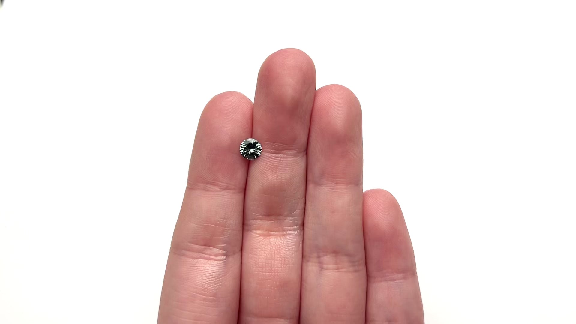 0.77ct 5.54x5.52x3.42mm Round Brilliant Sapphire 26134-07