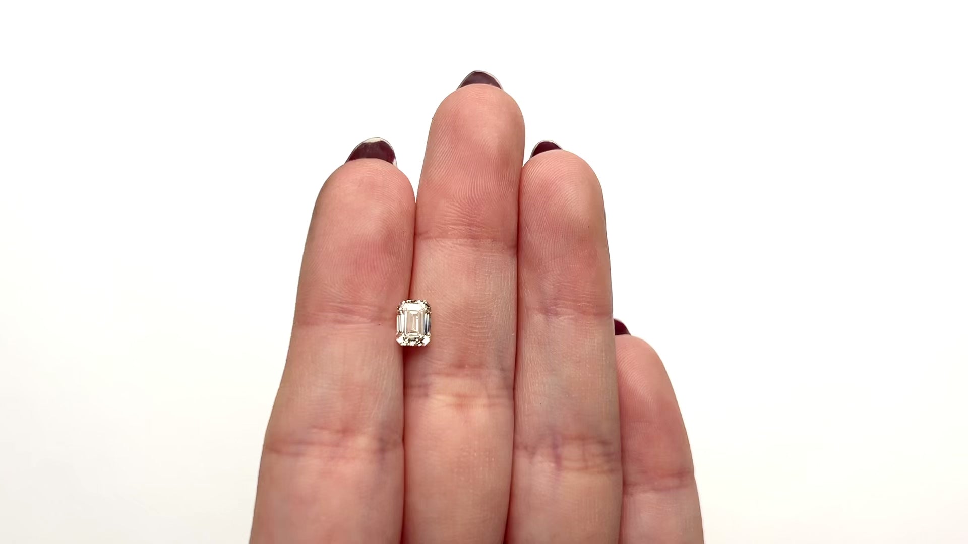 1.02ct 6.40x4.76x3.35mm VS1 Q-R Cut Corner Rectangle Step Cut 27376-10