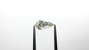 0.91ct 9.95x5.23x2.88mm SI1 K Shield Step Cut 25955-01