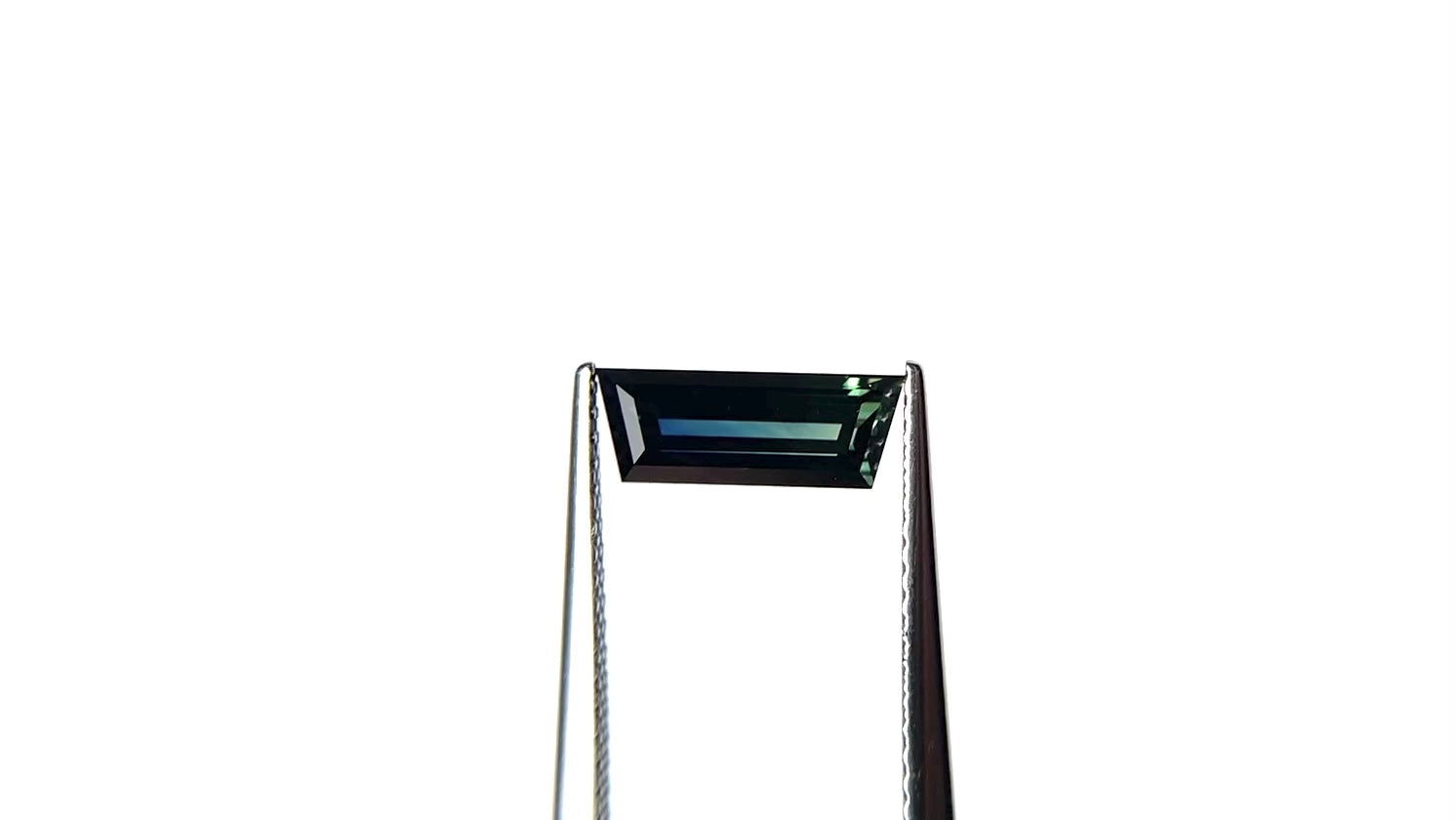 1.31ct 10.46x3.86x2.76mm Trapezoid Step Cut Sapphire 27766-11