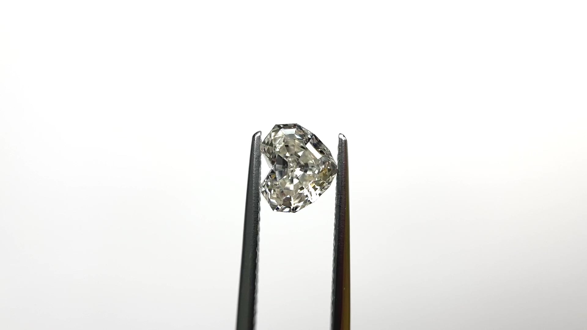1.43ct 6.43x7.28x4.43mm GIA VS2 M Geo Heart Step Cut 26314-01