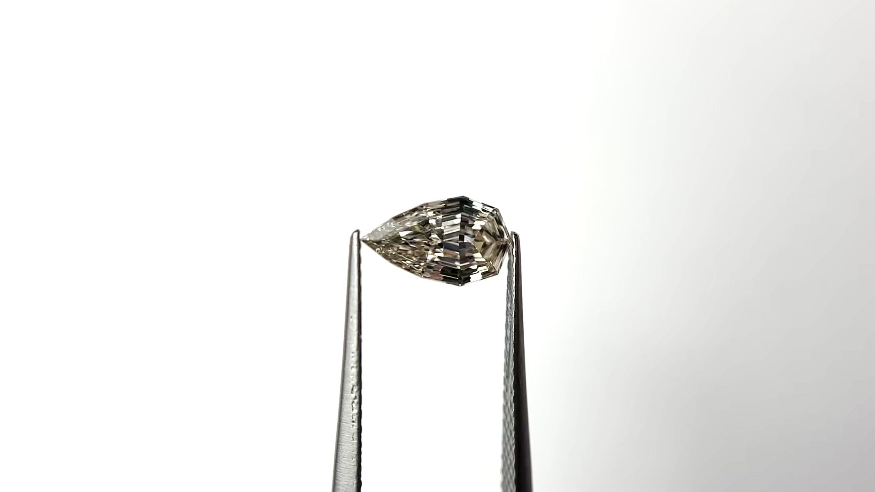 1.02ct 9.64x5.60x2.76mm VS2 U-V Geo Pear Step Cut 🇿🇦 27518-16