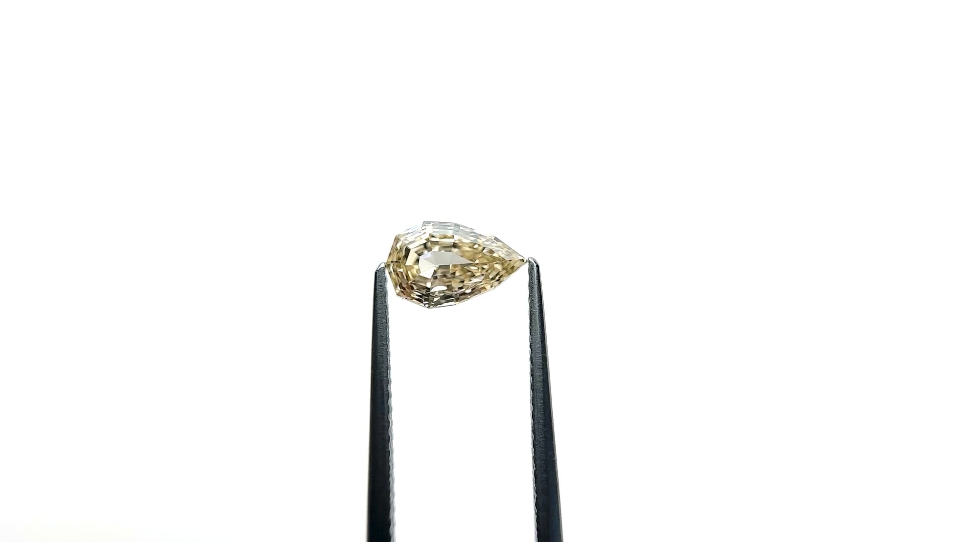 1.36ct 9.10x5.68x3.65mm VS1 Fancy Light Yellowish Brown Geo Pear Step Cut 28045-01