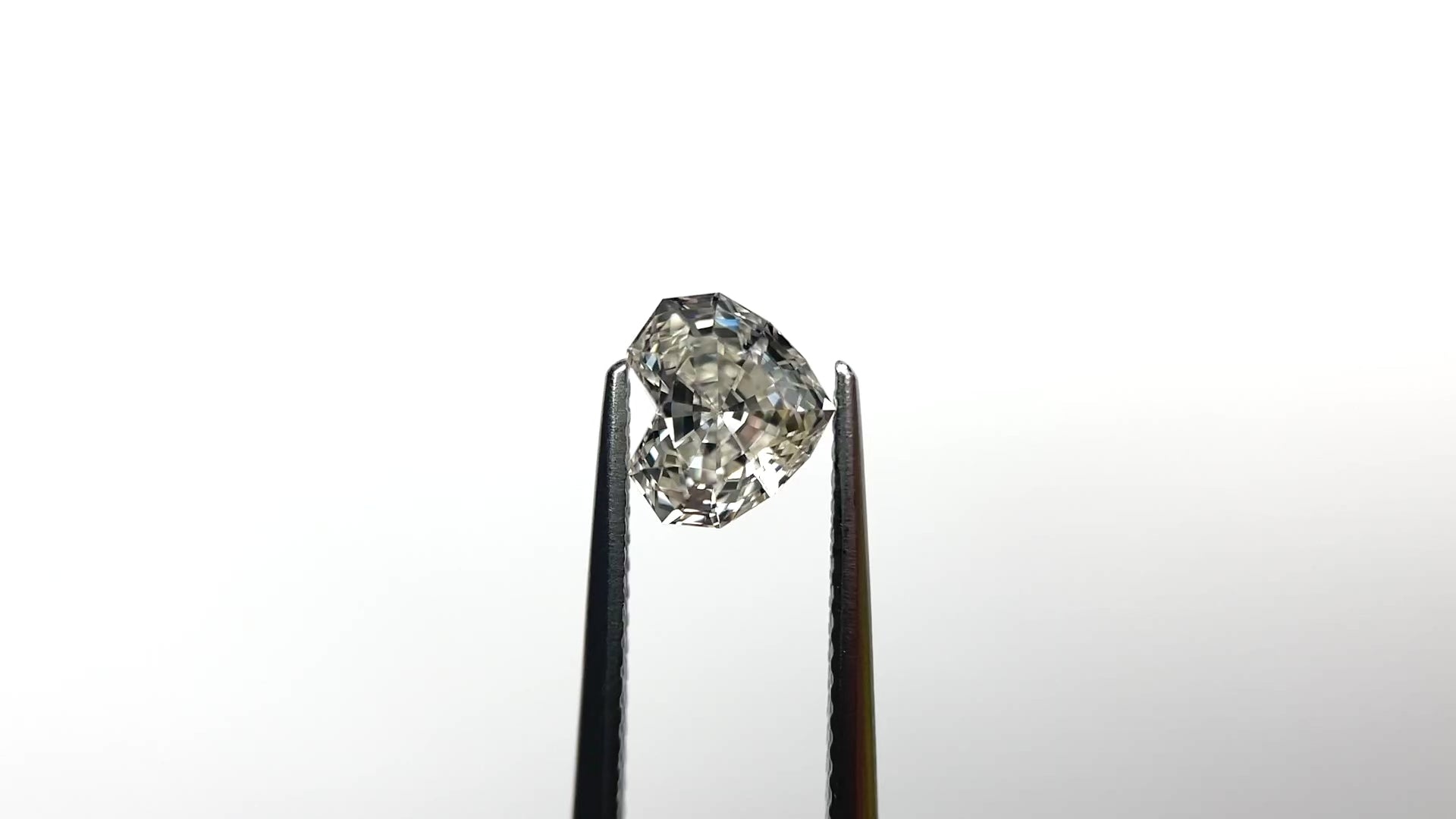 1.41ct 6.44x7.32x4.42mm GIA VVS2 L Geo Heart Step Cut 26314-02